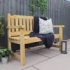 Waltons 2 Seater Pressure Treated Wooden Garden Bench 4ft 1 Waltons 2 Seater Pressure Treated Wooden Garden Bench 4ft -Plants Sale 4ft Bench Lifestyle Image